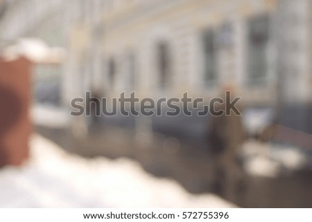 Abstract urban background with blurred buildings and street, shallow depth of focus.a