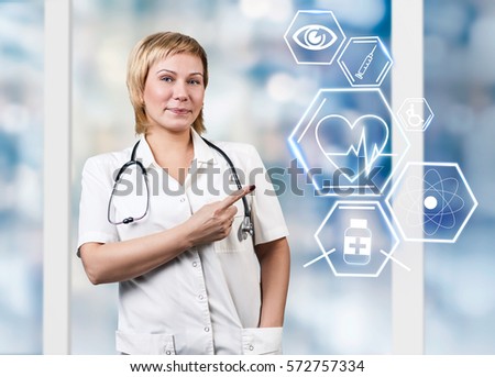 Female doctor working with healthcare icons