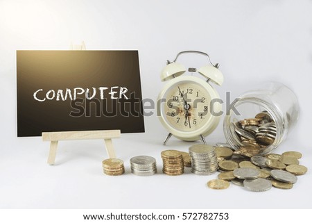 Chalk Board, Vintage Clock and Jar of coins for Saving Concept