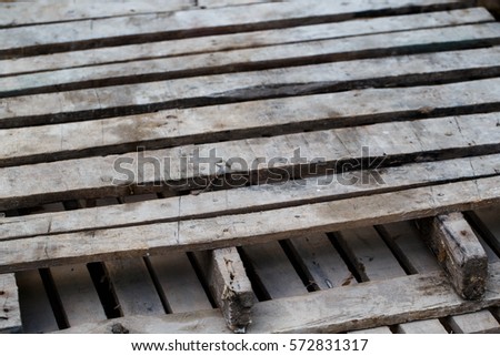 Stacks of old wooden pallets, Concept of shipping and logistics