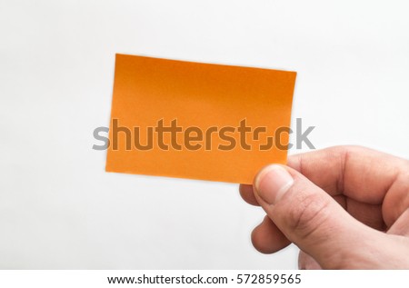 Sticker, ?ard Mock-Up ,Male hands holding a blank card on a white background.