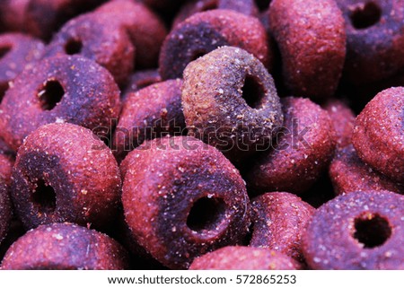 
Dog pet food texture. Dog Meat food background pattern texture. Red round animal food.
Studio photo texture photography