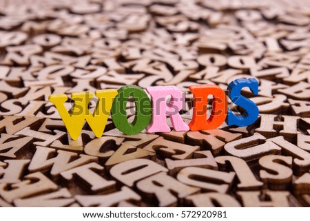 words word made from colored wooden letters on an old table. Concept