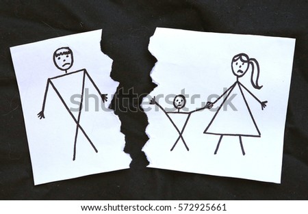 dad and mom with son divorce drawing on torn paper