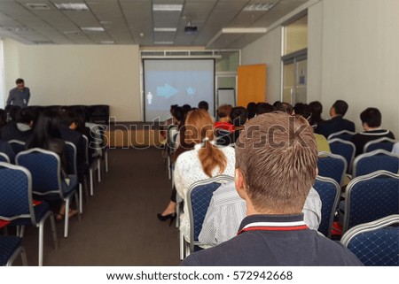 The image of a conference in a conference hall