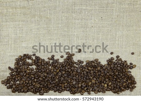 Coffee beans on a background of canvas