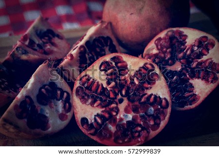 Picture of pomegranate, with a home style background