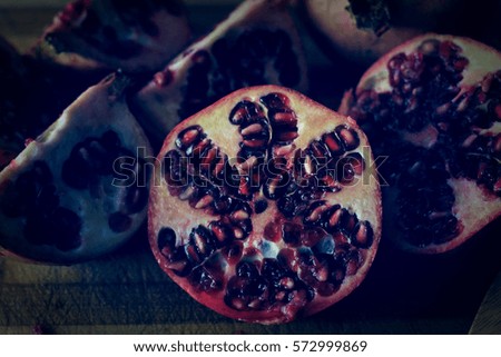 Picture of pomegranate, with a home style background