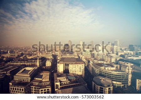 Aerial London view on a foggy day from St Paul's cathedral - vintage styled photo