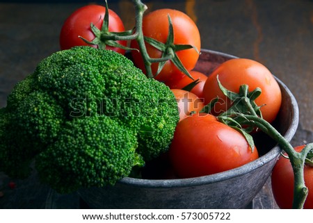 Healthy Foods in Aged Silver Bowl. Food Background. Tomato and Broccoli.