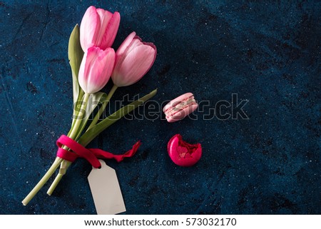 pink tulip flowers and notes paper on blue rustic , breakfast on Mothers day or Women day