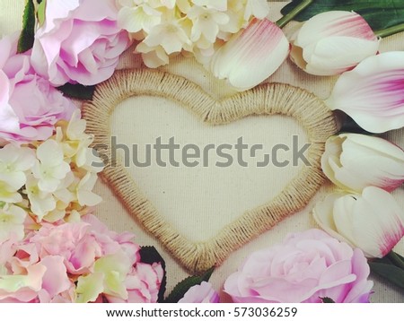 heart shape symbol decorate with beautiful flowers