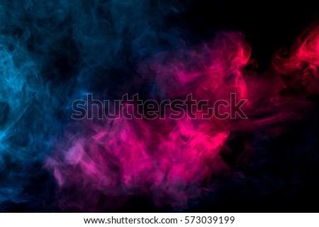 multicolor smoke on black background Royalty-Free Stock Photo #573039199
