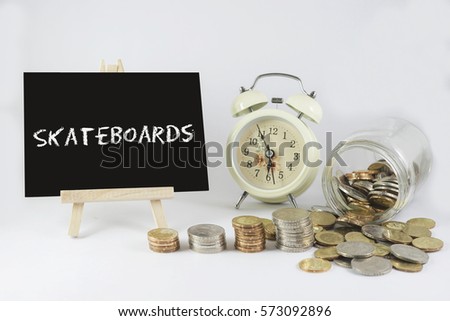 Chalk Board, Vintage Clock and Jar of coins for Saving Concept