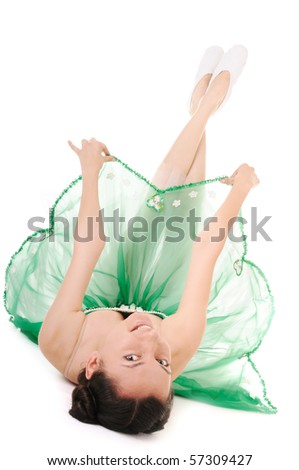 Lie young woman in green ballet dress on white background