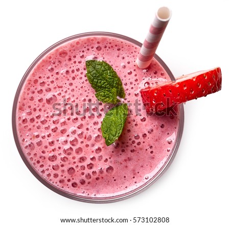 Glass of pink strawberry milkshake or cocktail isolated on white background. From top view