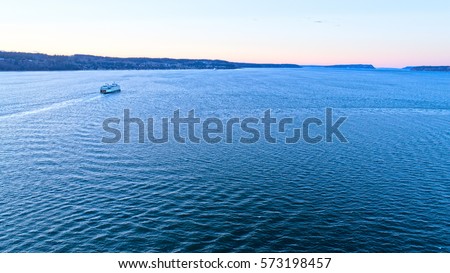 Washington State Ferry Boat in Puget Sound Sunset Mukilteo Whidbey Island Royalty-Free Stock Photo #573198457