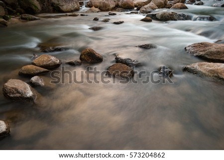 River Bed.A mountain river flowing thorough stone.