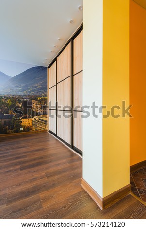 Part of the living room interior in orange colors