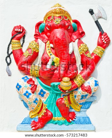 God of success 27 of 32 posture. Indian style or Hindu God Ganesha avatar image in stucco low relief technique with vivid color,Wat Samarn, Chachoengsao,Thailand.