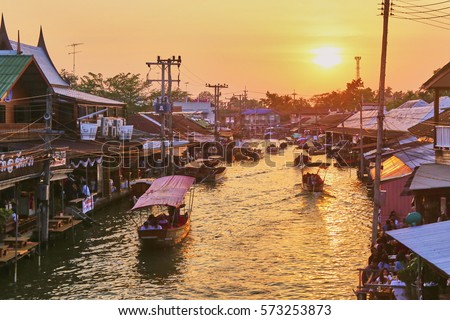 Twilight time at Amphawa floating market, Thailand Royalty-Free Stock Photo #573253873