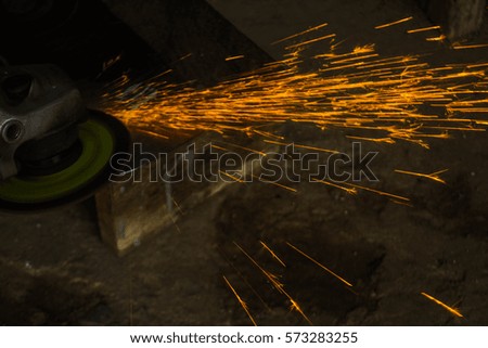 Knife grinding during working make fire bits