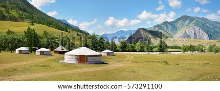 Yurts in the Altai Mountains Royalty-Free Stock Photo #573291100