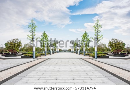 public square with empty road floor in downtown Royalty-Free Stock Photo #573314794