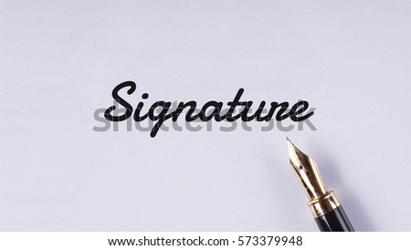 "Signature" words written on white paper using fountain pen - business and finance concept