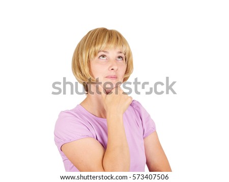 Young woman thinking looking up. Blonde girl dreaming with new ideas. Isolated on background.