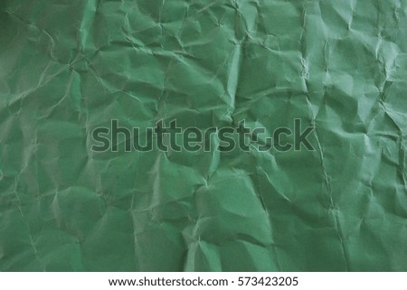 damaged green paper texture as easy background