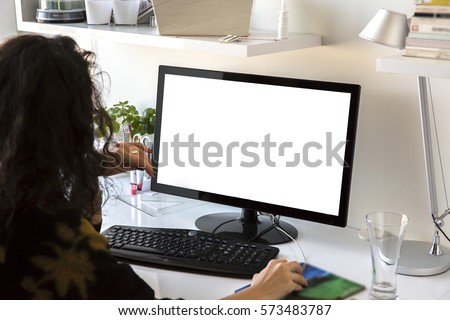 Closeup image of woman's hands keyboarding blank copy space screen for your text message or advertising content, young female writing letter or e-mail on desktop computer to her friend Royalty-Free Stock Photo #573483787