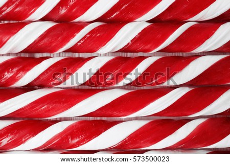 Red and white candy canes background