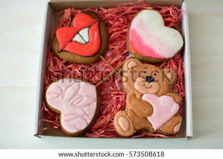 Saint Valentine day gingerbread covered with sugar icing in a box