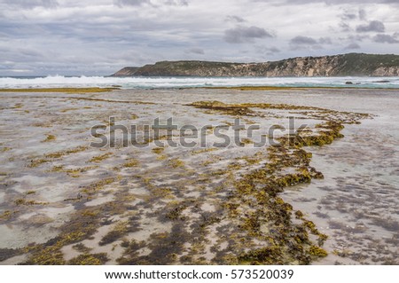 Pennington Bay at low tide in stormy weather landscape. Kangaroo Island, South Australia