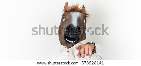 Businessman portrait wearing horse head wants you letterbox Royalty-Free Stock Photo #573526141