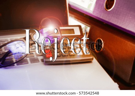 Reject word, text with business concepts background with note book and file in table