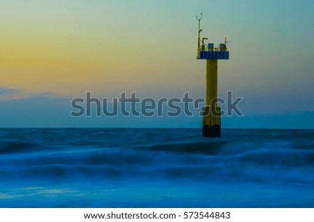 Long exposure landscape picture of the Belgian coast at sunset
