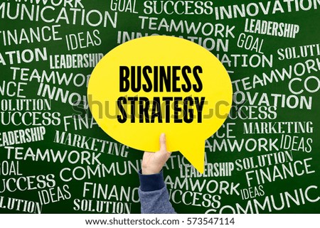Business Strategy Written Speech Bubble on Blackboard