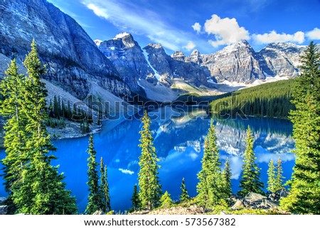 Wenkchemna Peaks Reflection on Moraine Lake, Banff, Rocly Mountain, Canada Royalty-Free Stock Photo #573567382