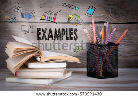 Examples, Business Concept. Stack of books and pencils on the wooden table. Royalty-Free Stock Photo #573591430