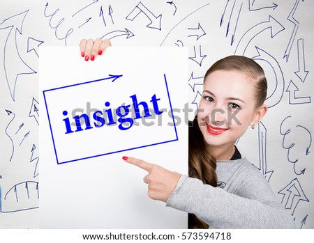 Young woman holding whiteboard with writing word: insight. Technology, internet, business and marketing.