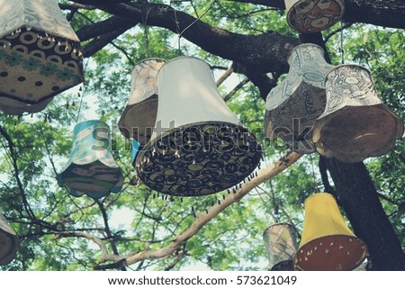 Lamp on tree branch.