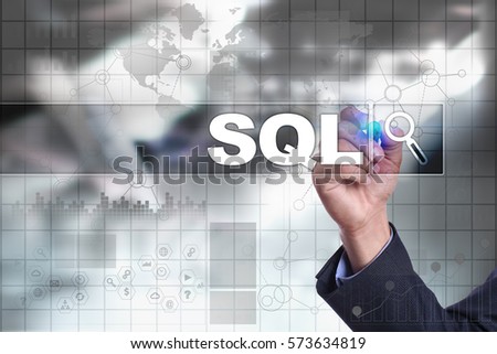 Businessman drawing on virtual screen. sql concept.