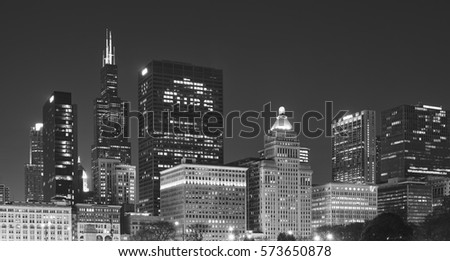 Black and white picture of Chicago downtown at night, USA.