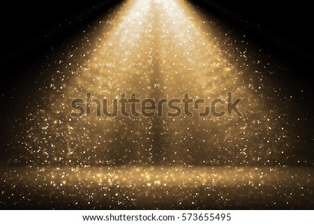 Stage light and golden glitter lights on floor. Abstract gold background for display your product. Spotlight realistic ray. Merry Christmas 2020 Royalty-Free Stock Photo #573655495