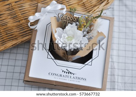 beautiful flower bouquet in paper box as congratulation gift for who you love