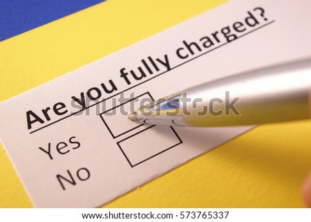 Are you fully charged? Yes or no Royalty-Free Stock Photo #573765337