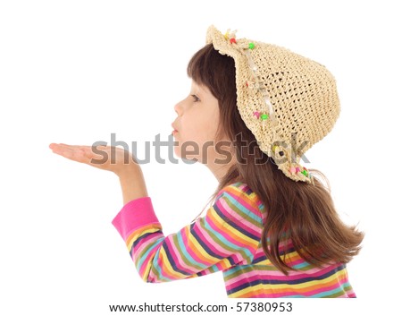 Little girl blows with an empty hand, isolated on white