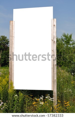 Blank Vertical Sign with Wildflowers on a Sunny Summer Day